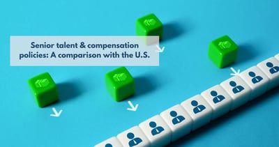 The photograph illustrates the concept of compensation policies and senior talent through a symbolic composition. A row of white cubes, each representing individuals or talent, aligns diagonally on a vibrant blue background. Four green cubes, displaying a growth or positive trend icon, are strategically placed around them, pointing with white arrows towards the line of talent.
